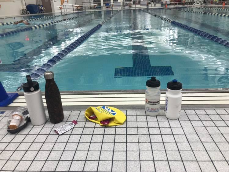 Water bottles near a swimming pool